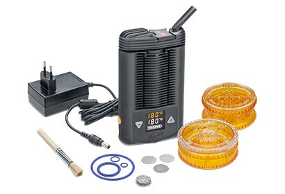 Mighty vaporizer with house charger, cleaning brush, mesh screens, two grinders and rubber bands