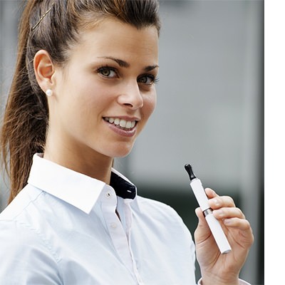 Beautiful Brunette Female Vaping